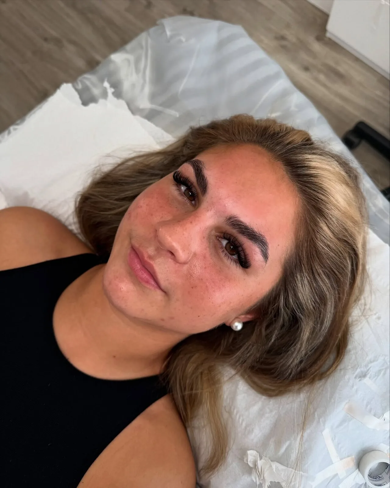 brow and lash result on a blonde client