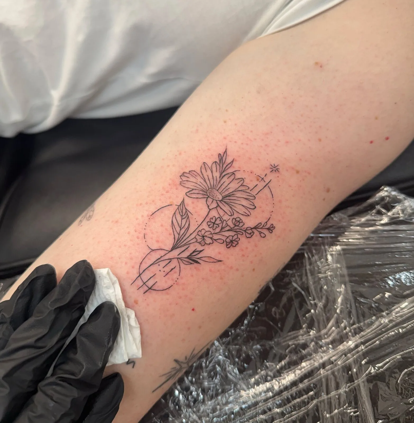 delicate floral fine line tattoo result